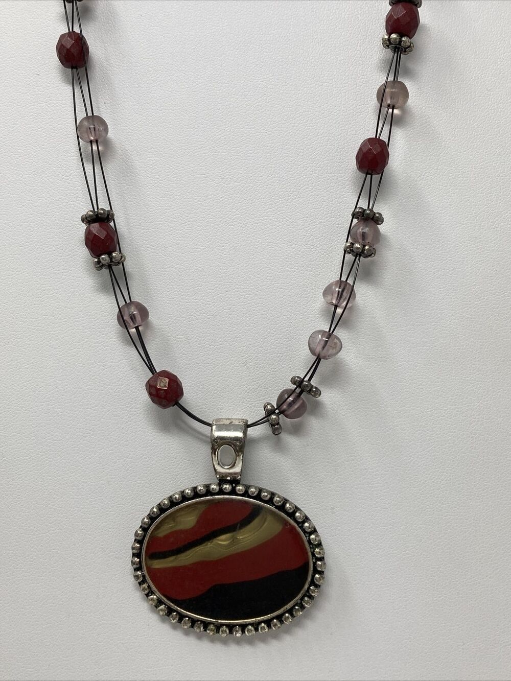 Pendant Necklace Signed HM Red Black Tan Oval with Beads Beaded
